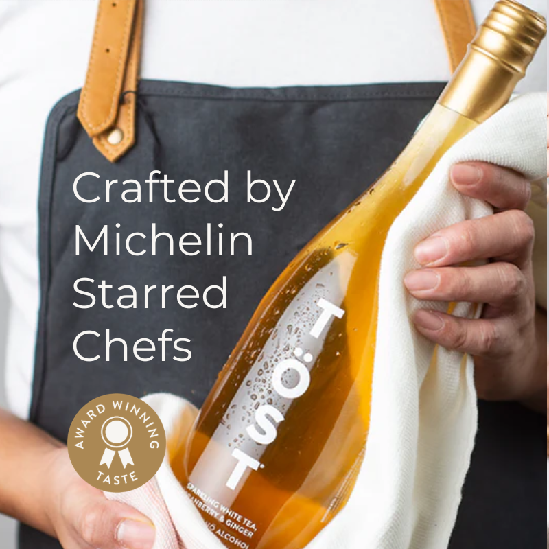Bottle of TOST with a person holding it, wearing a apron, and text about Michelin starred chefs.
