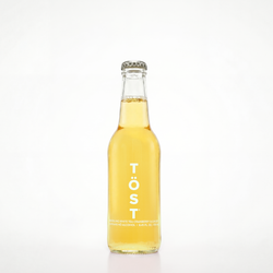 Bottle of Töst on a white background