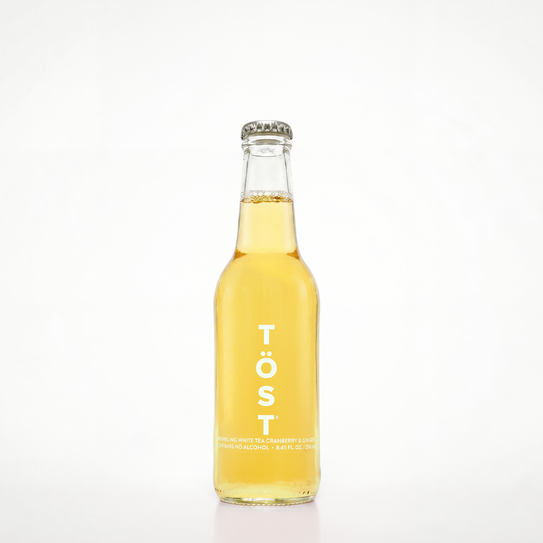 Bottle of Töst on a white background