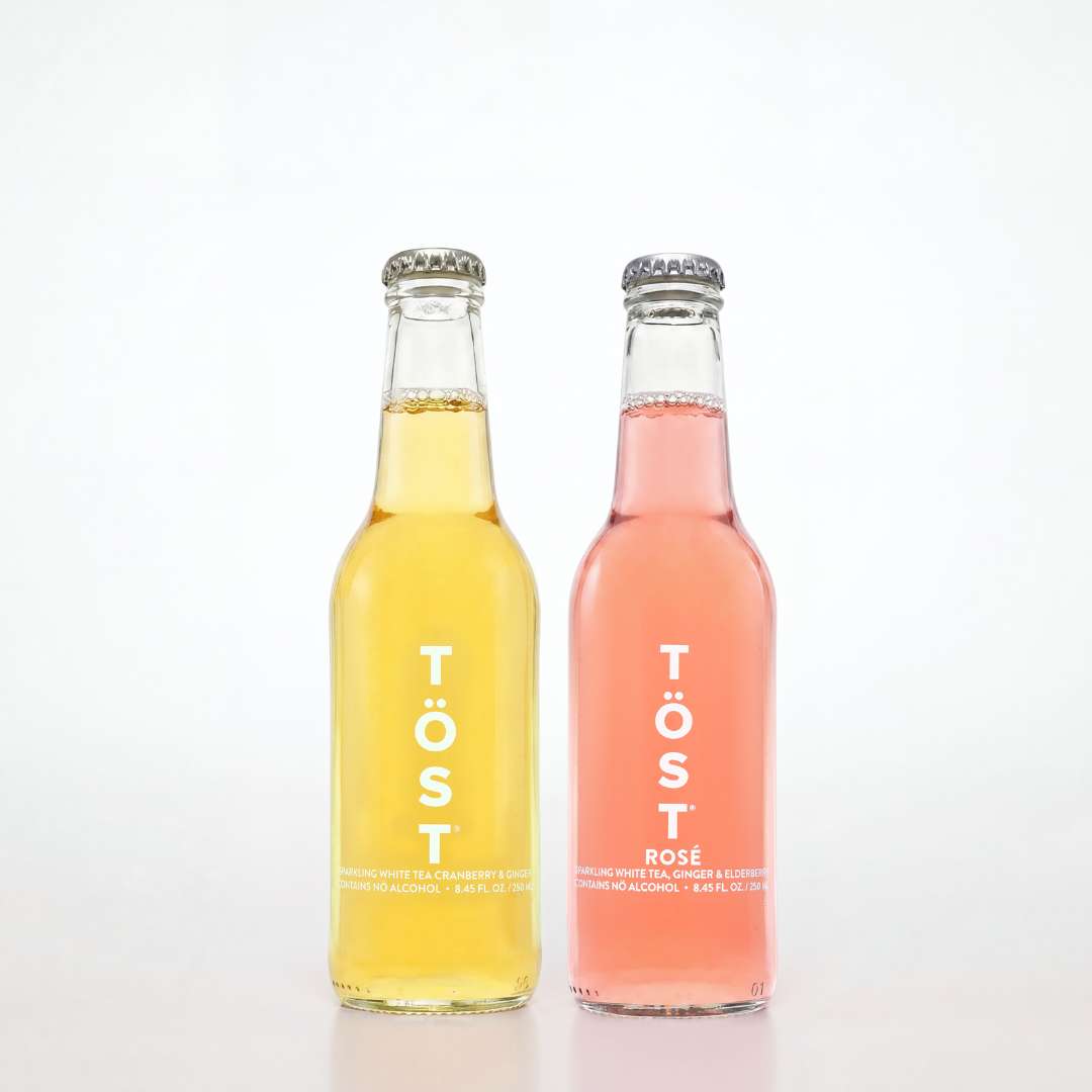 Töst and Rose bottles on a white background