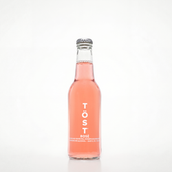 Bottle of Töst Rosé on a white background