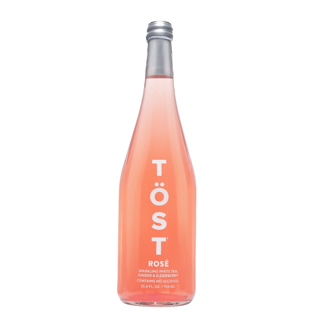 TÖST Rosé non alcoholic sparkling beverage 750ml bottle with pink coral liquid
